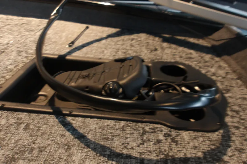Slide: The Image of 2026 Tracker Pro Team 190 boat interior with control panel and wiring. - 14