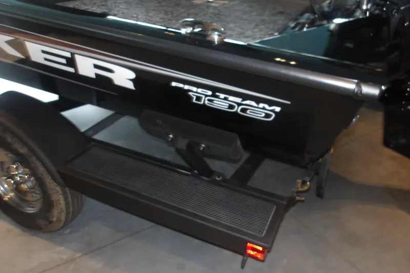 Slide: The Image of 2026 Tracker Pro Team 190 boat trailer with visible branding and step platform. - 8