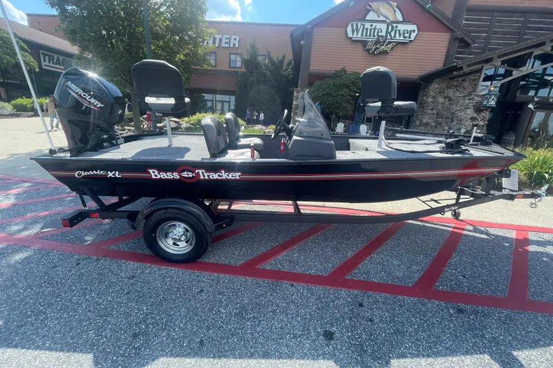 The Image of 2026 Tracker Bass Tracker Classic XL boat on display outside a showroom. - 0