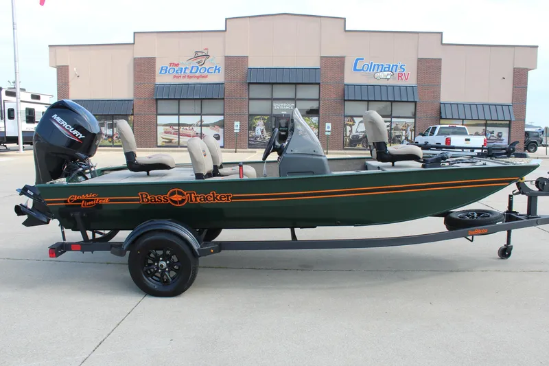 The Image of 2026 Tracker Bass Tracker Classic Limited boat on trailer outside dealership. - 0