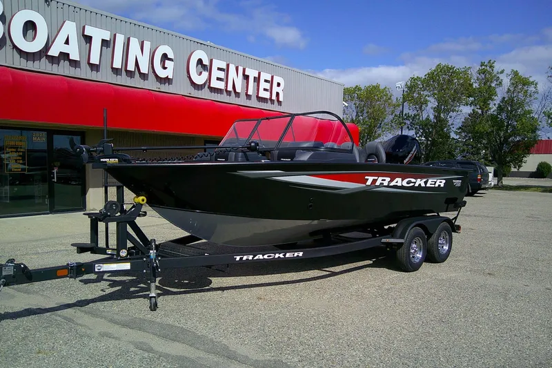 Slide: The Image of 2026 Tracker Targa V-18 WT boat on trailer outside Boating Center. - 88