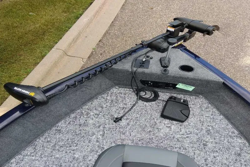 Slide: The Image of 2026 Tracker Pro Guide V-175 WT boat with Minn Kota trolling motor on deck. - 2