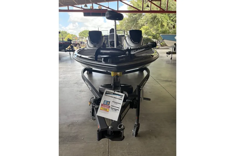 Slide: The Image of 2026 Nitro Z17 boat displayed indoors, showcasing sleek design and modern features. - 101