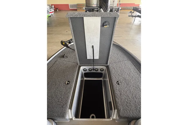 Slide: The Image of 2026 Nitro Z17 boat interior storage compartment with open lid, showcasing spacious design. - 9