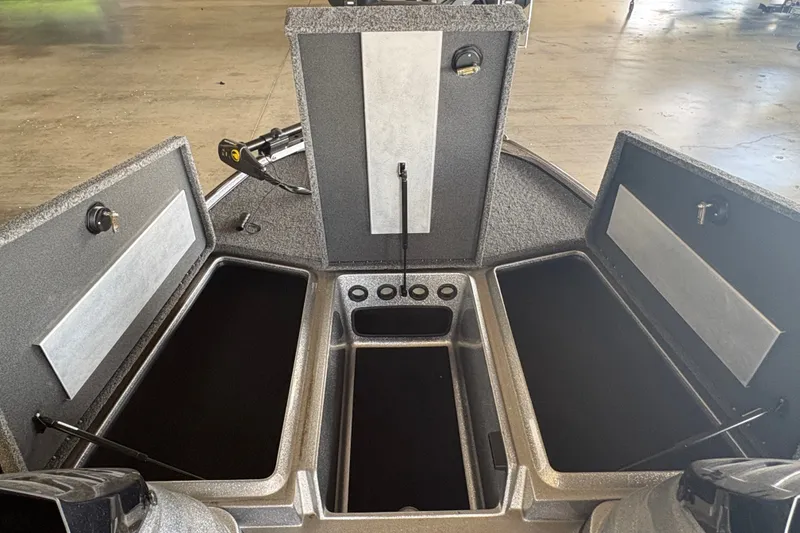 Slide: The Image of 2026 Nitro Z17 boat storage compartments open, showcasing spacious interior design. - 10