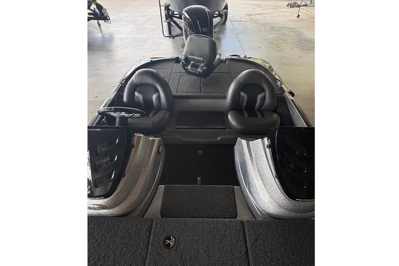 Slide: The Image of 2026 Nitro Z17 boat interior with dual seats and storage compartments. - 8