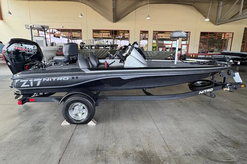 Slide: The Image of 2026 Nitro Z17 boat displayed indoors, showcasing sleek design and modern features. - 2