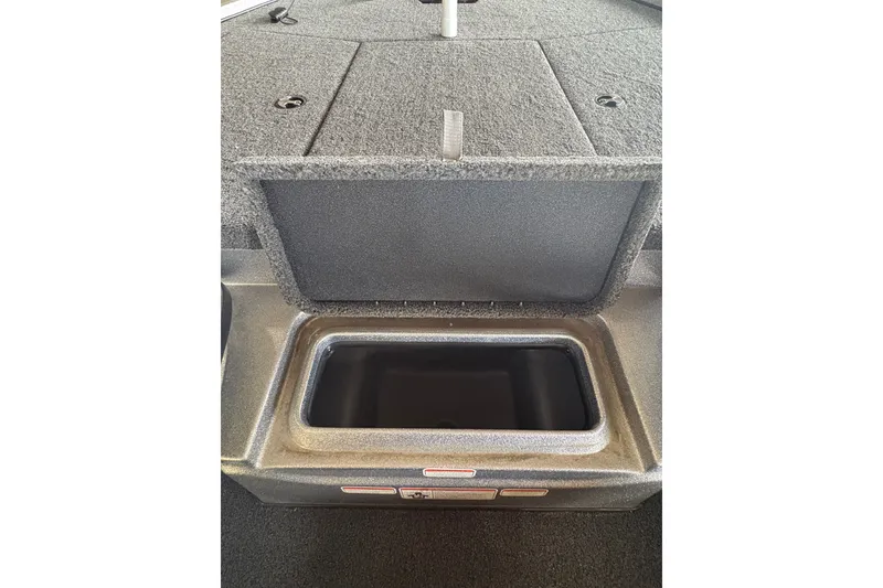 Slide: The Image of Open storage compartment in 2026 Nitro Z17 boat, showcasing spacious interior design. - 11