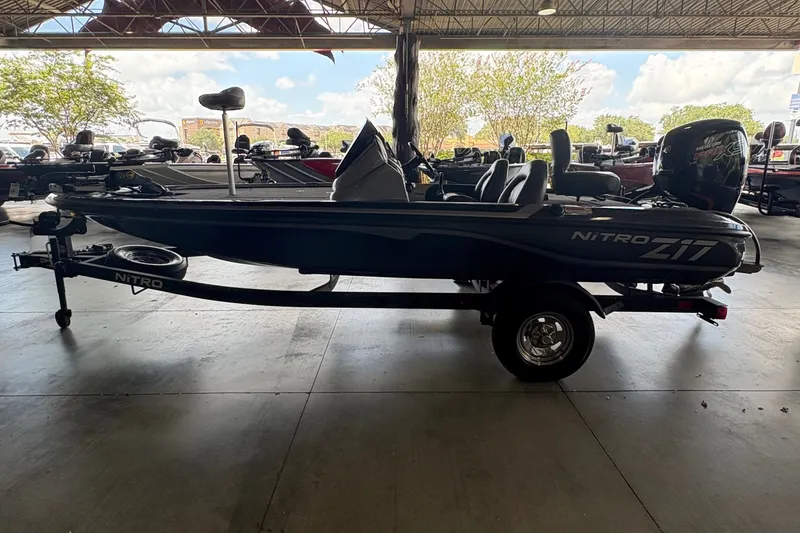 Slide: The Image of 2026 Nitro Z17 boat in a covered showroom, side view. - 4