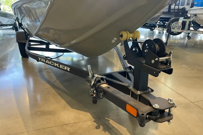 Slide: The Image of 2026 Tracker Pro Team 175 Crappie Edition boat on trailer in showroom. - 6