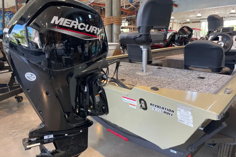 Slide: The Image of 2026 Tracker Pro Team 175 Crappie Edition boat with Mercury outboard motor in showroom. - 4