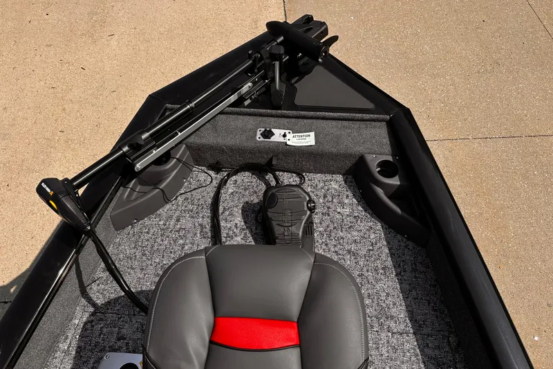 Slide: The Image of 2026 Tracker Pro Team 175 Crappie Edition boat interior with seat and trolling motor. - 3