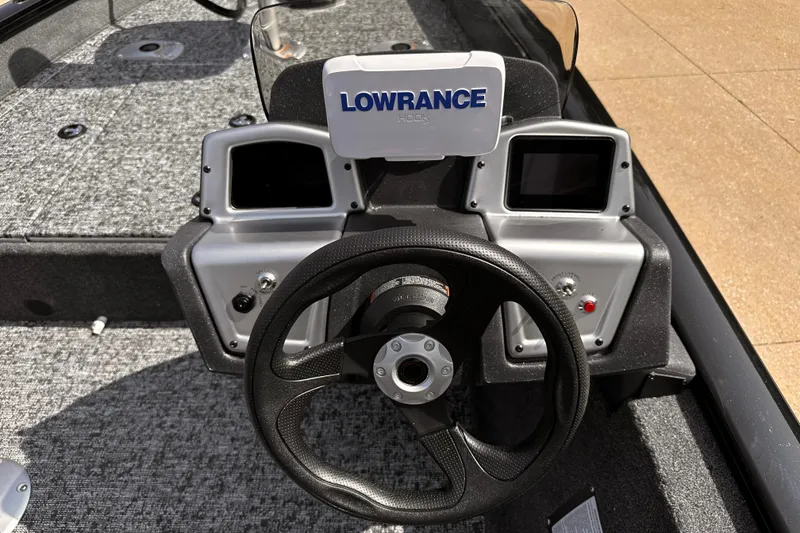 Slide: The Image of 2026 Tracker Pro Team 175 Crappie Edition boat dashboard with Lowrance electronics. - 5