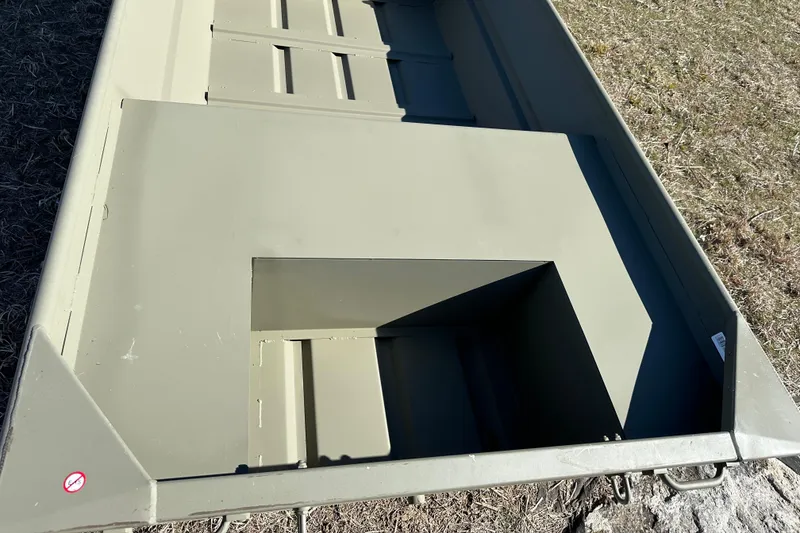 Slide: The Image of 2026 Tracker Grizzly 14 Jon boat interior, showcasing durable construction and spacious design. - 8