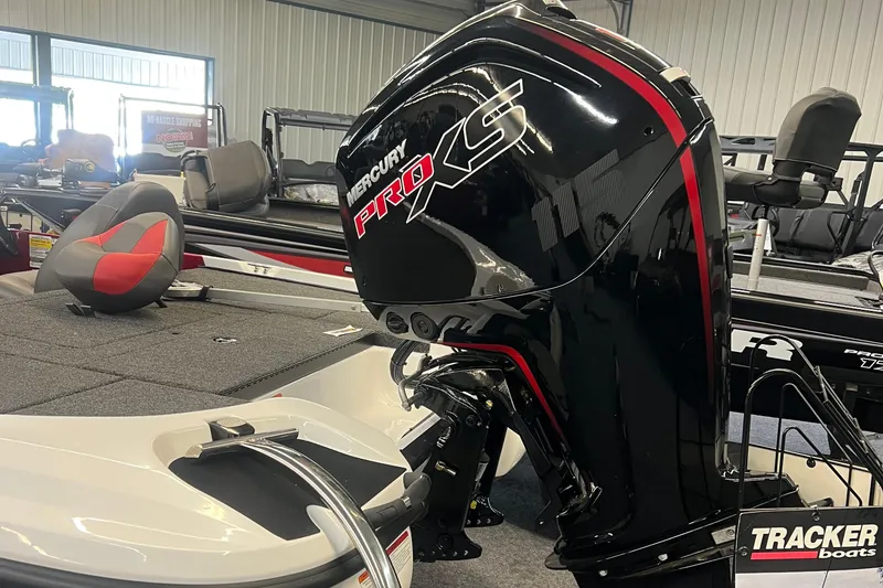 Slide: The Image of 2026 Nitro Z17 boat with Mercury Pro XS engine in showroom. - 3