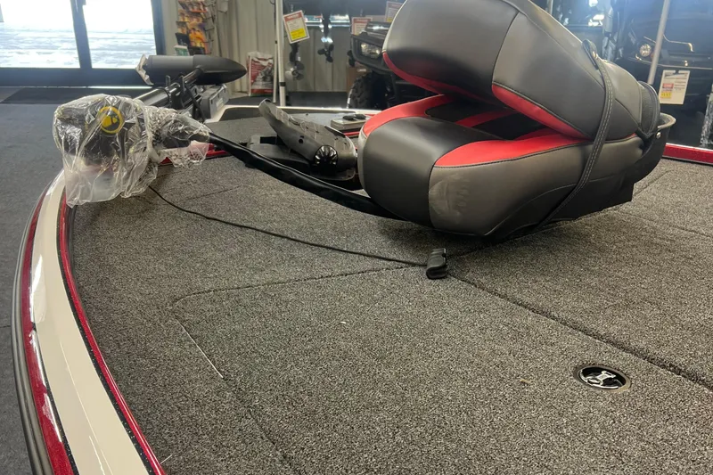 Slide: The Image of 2026 Nitro Z17 boat interior with cushioned seat and carpeted deck. - 4