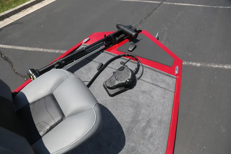 Slide: The Image of 2026 Tracker Bass Tracker Classic XL boat deck with seat and trolling motor. - 2