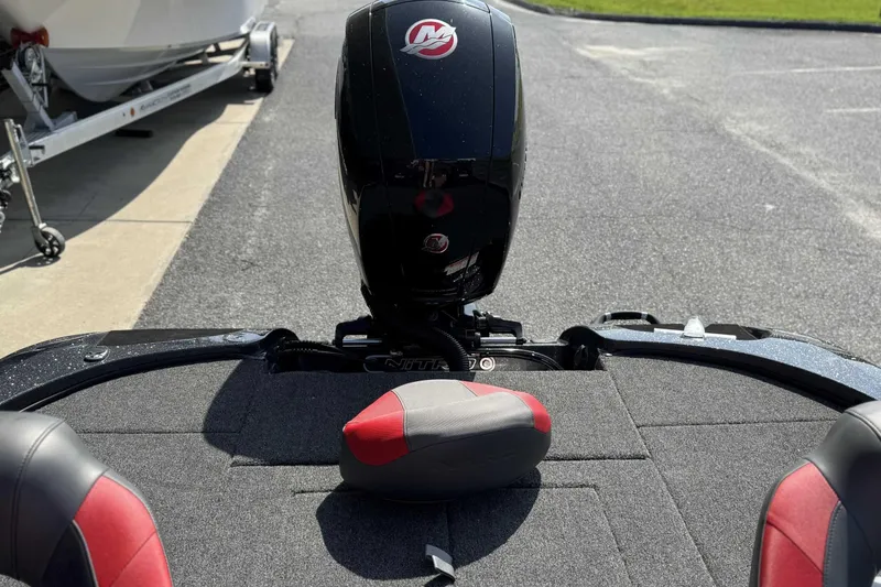 Slide: The Image of 2026 Nitro Z18 Pro boat with powerful outboard motor and sleek design. - 6