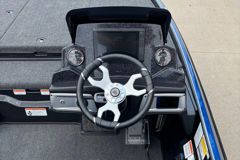 Slide: The Image of 2026 Nitro Z20 XL Pro boat dashboard with steering wheel and gauges. - 5