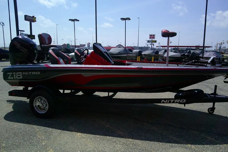 Slide: The Image of 2026 Nitro Z18 Pro boat on trailer in parking lot, side view. - 5
