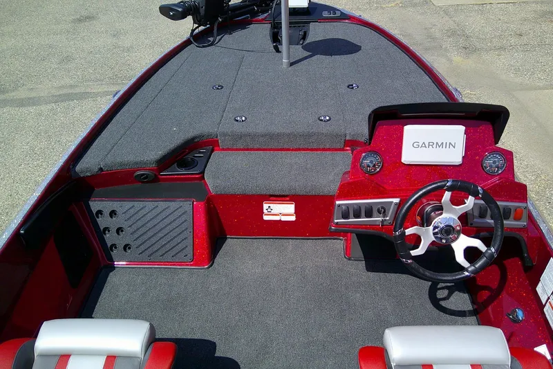 Slide: The Image of Interior of 2026 Nitro Z18 Pro boat with Garmin dashboard and steering wheel. - 6
