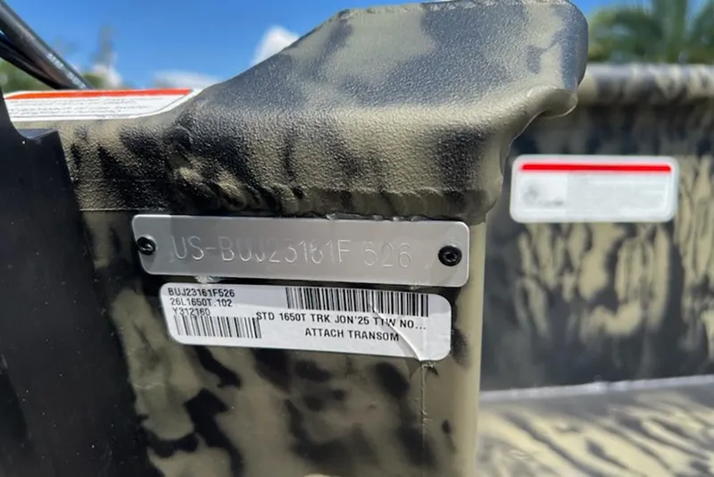 Slide: The Image of 2026 Tracker Grizzly 1650 T Prairie Wings Edition, close-up of identification plate. - 11