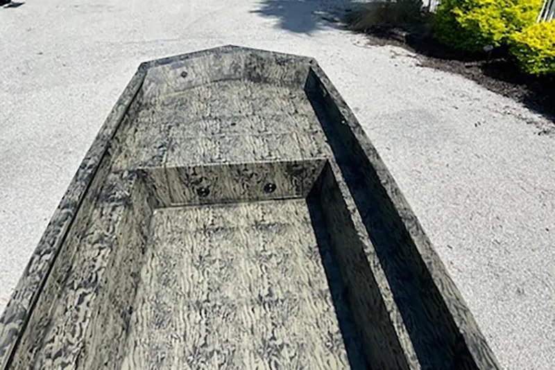 Slide: The Image of 2026 Tracker Grizzly 1650 T Prairie Wings Edition boat with camouflage interior design. - 9