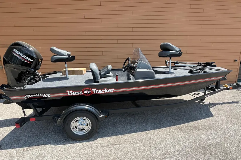 The Image of 2026 Tracker Bass Tracker Classic XL fishing boat with Mercury engine on trailer. - 0