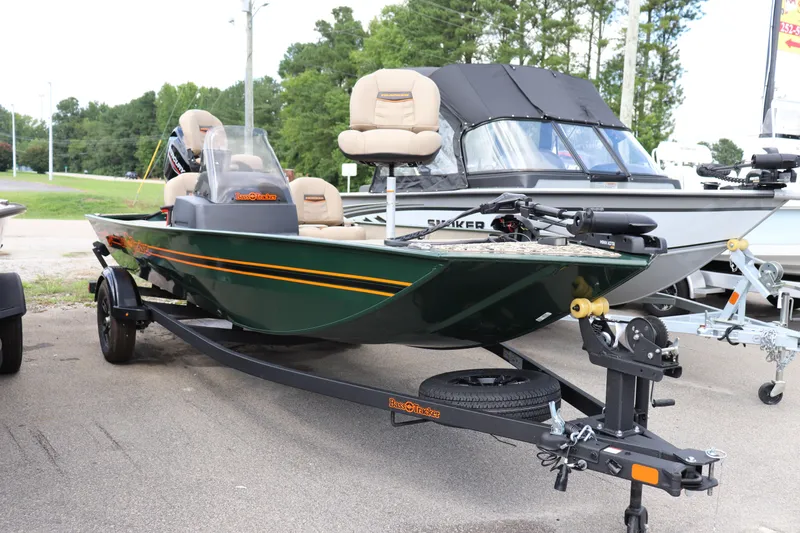 The Image of 2026 Tracker Bass Tracker Classic Limited boat on trailer, parked outdoors. - 0