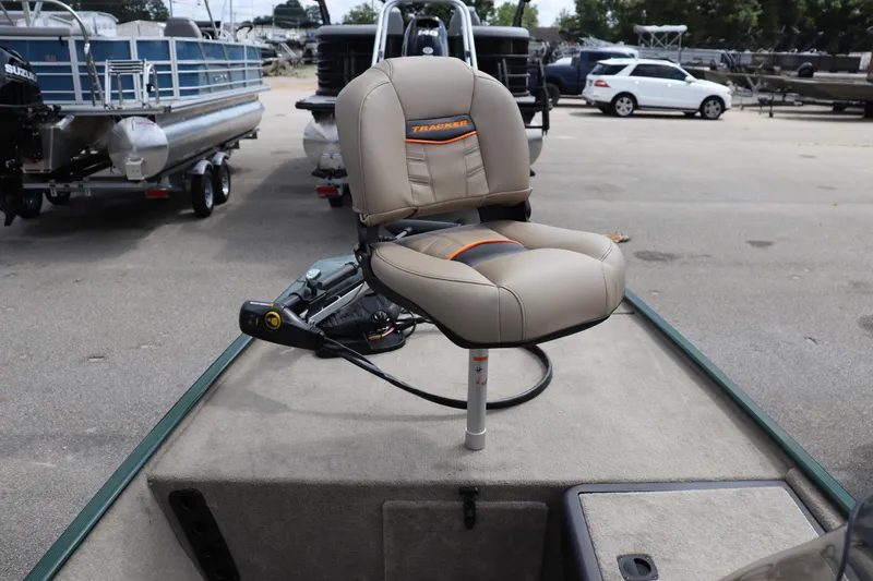Slide: The Image of 2026 Tracker Bass Tracker Classic Limited boat seat in a marina setting. - 3