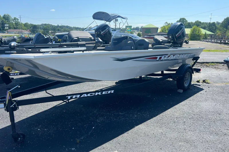 The Image of 2026 Tracker Pro 170 boat on trailer, parked outdoors under clear sky. - 0