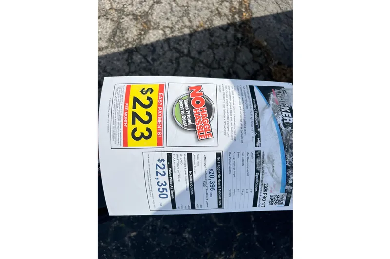 Slide: The Image of 2026 Tracker Pro 170 price sheet with no-haggle pricing and easy payment options. - 11