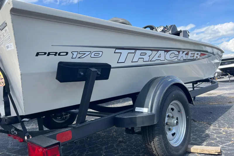 Slide: The Image of 2026 Tracker Pro 170 boat on trailer, showcasing sleek design and branding. - 8