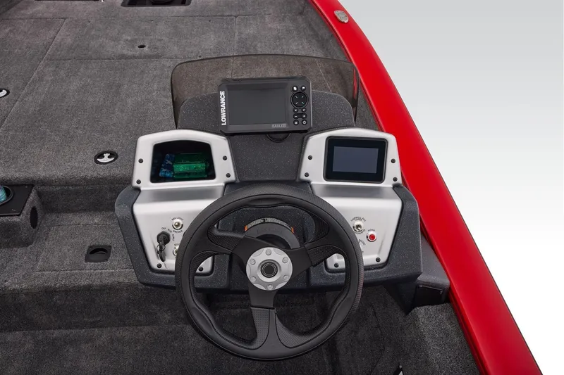 Slide: The Image of 2026 Tracker Pro Team 190 boat dashboard with steering wheel and electronic displays. - 27