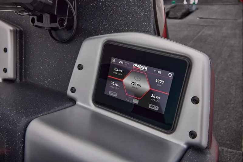 Slide: The Image of 2026 Tracker Pro Team 190 boat dashboard with digital display showing engine data. - 30
