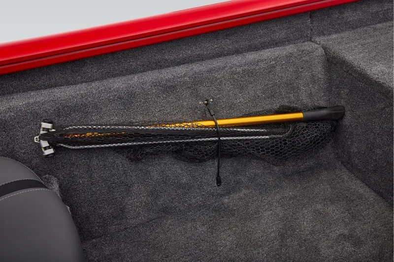 Slide: The Image of Storage compartment in 2026 Tracker Pro Team 190 boat with fishing net. - 34