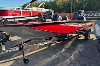 Slide: The Image of 2026 Tracker Pro Team 190 boat, red and gray, on trailer, outdoor display. - 4