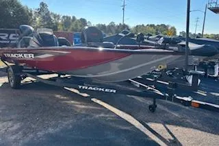 Slide: The Image of 2026 Tracker Pro Team 190 boat on trailer, parked outdoors. - 5