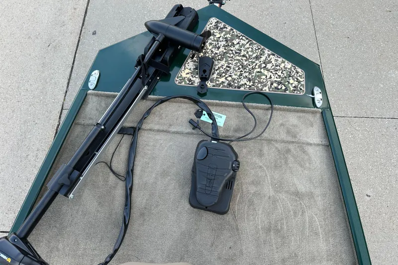 Slide: The Image of 2026 Tracker Bass Tracker Classic Limited boat deck with trolling motor and foot pedal. - 3