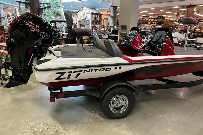 Slide: The Image of 2026 Nitro Z17 boat with Mercury Pro XS engine displayed indoors. - 2