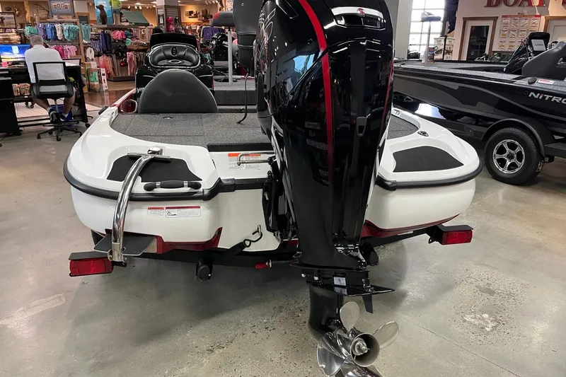Slide: The Image of 2026 Nitro Z17 boat in showroom, rear view with motor and propeller. - 5