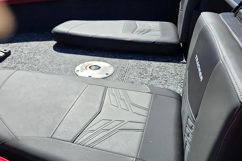 Slide: The Image of Interior of 2026 Tracker Pro Guide V-175 WT boat with cushioned seating. - 96
