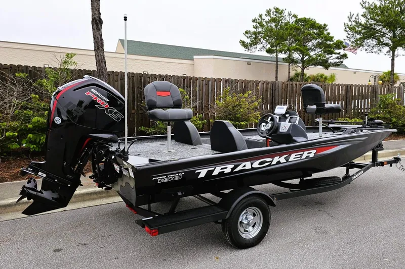Slide: The Image of 2026 Tracker Pro Team 190 boat on trailer, featuring Mercury Pro XS engine. - 2