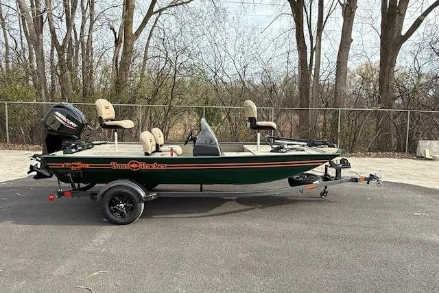 The Image of 2026 Tracker Bass Tracker Classic Limited boat on trailer, parked outdoors. - 0