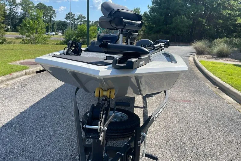 Slide: The Image of 2026 Tracker Pro 170 boat on trailer, parked on a sunny day. - 4