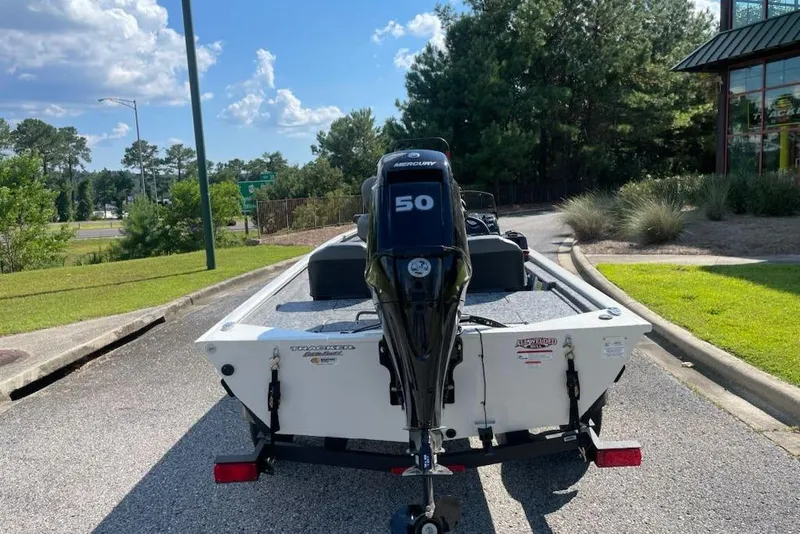 Slide: The Image of 2026 Tracker Pro 170 boat with Mercury 50 engine on a sunny day. - 70