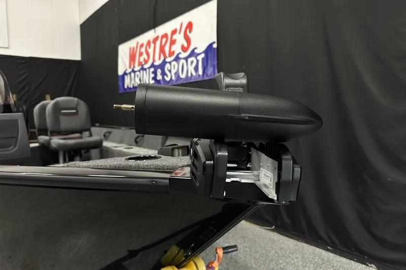 Slide: The Image of 2026 Tracker Pro Guide V-16 SC boat interior with motor detail at Westre's Marine & Sport. - 7