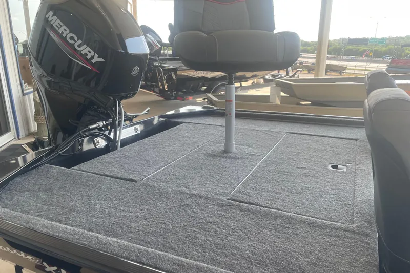 Slide: The Image of 2026 Tracker Bass Tracker Classic XL boat with Mercury engine and seating. - 6