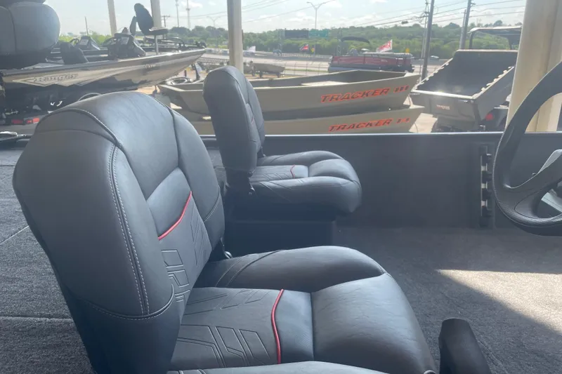 Slide: The Image of 2026 Tracker Bass Tracker Classic XL boat interior with comfortable seating. - 7