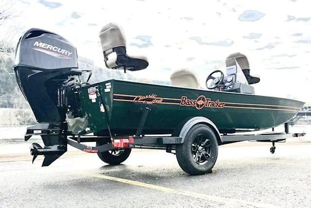 Slide: The Image of 2026 Tracker Bass Tracker Classic Limited boat on trailer with Mercury engine. - 64